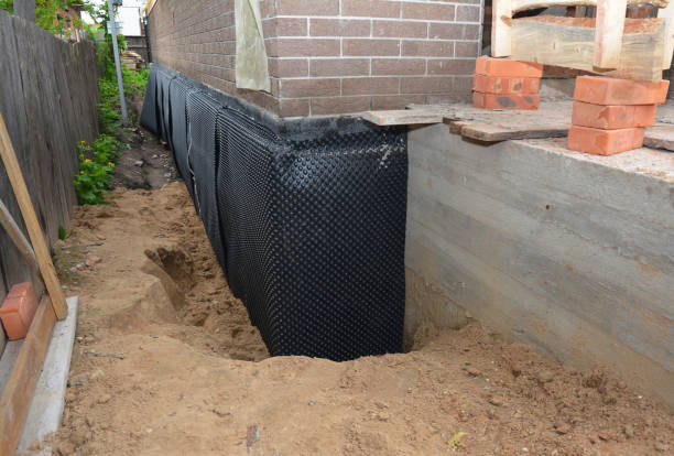 Happy homeowners after waterproofing job in Byrdstown